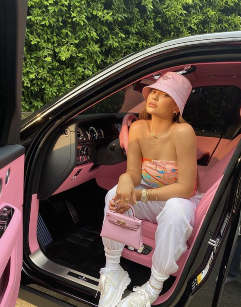 Kylie Jenner with Rolls Royce pink car